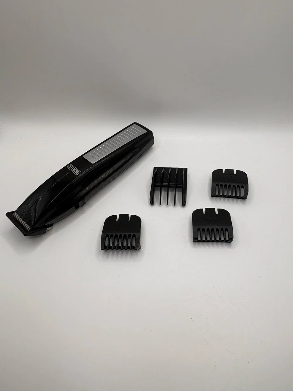 Wahl Cordless Rechargeable Hair Beard Trimmer Clipper Black w/ 4 Guide Combs